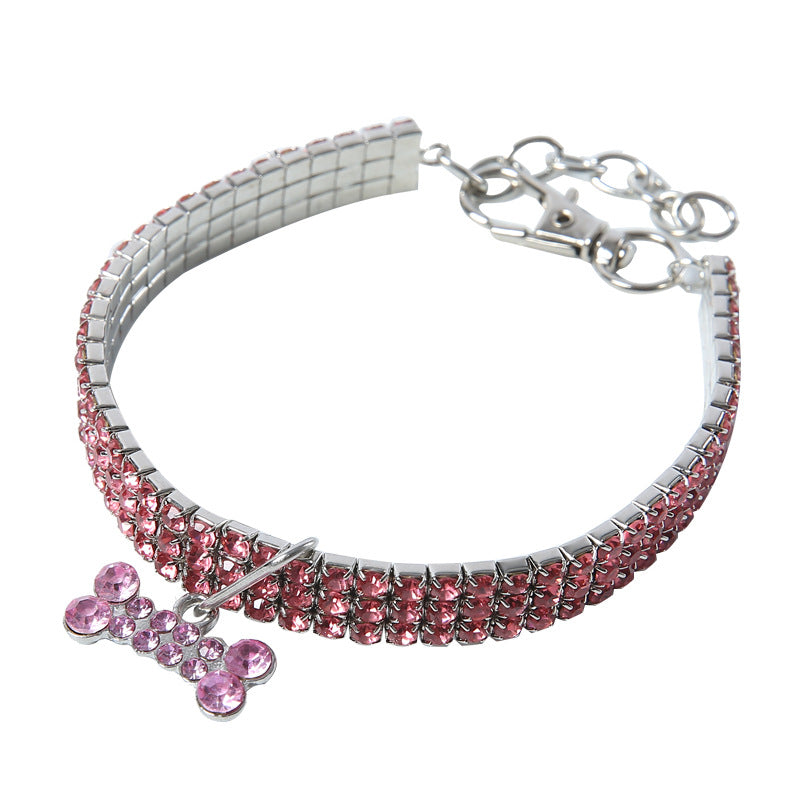 Collier MonPachaTech rose pour chien ou chat avec strass brillants et pendentif en forme d'os en cristal