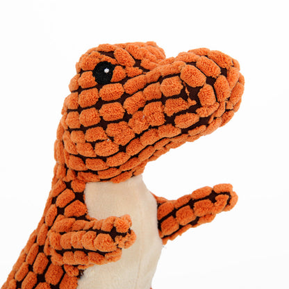 Jouet peluche dinosaure orange MonPachaTech pour chien en texture chenille bouclette avec couineur intégré